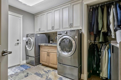 34 Sunrise Way, Priddis Greens, AB - Indoor Photo Showing Laundry Room