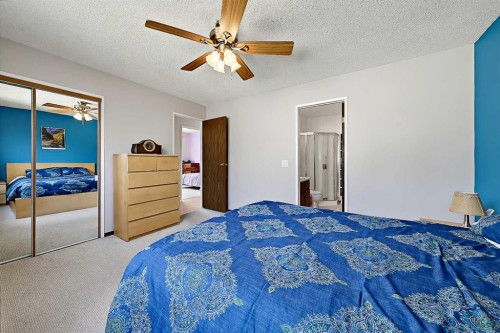 40 River Valley Crescent Se, Calgary, AB - Indoor Photo Showing Bedroom