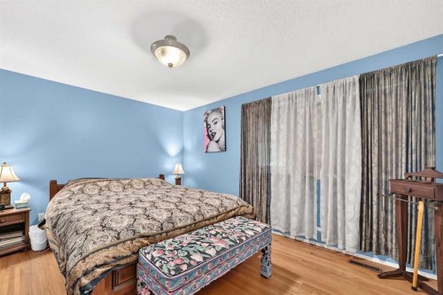 728 Willacy Drive Se, Calgary, AB - Indoor Photo Showing Bedroom