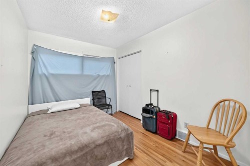 728 Willacy Drive Se, Calgary, AB - Indoor Photo Showing Bedroom