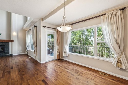 91 St Moritz Terrace Sw, Calgary, AB - Indoor With Fireplace