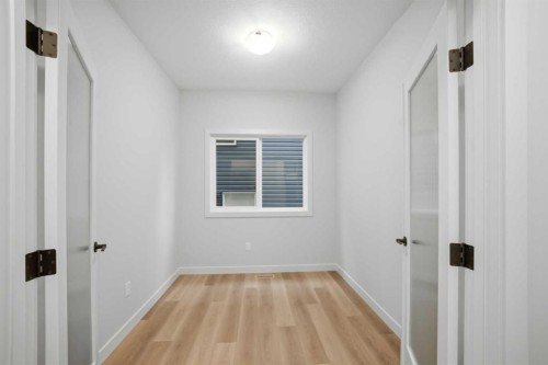 145 Topaz Place, Cochrane, AB - Indoor Photo Showing Other Room
