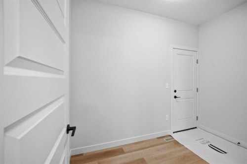 145 Topaz Place, Cochrane, AB - Indoor Photo Showing Other Room