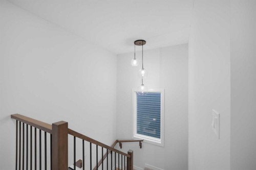 145 Topaz Place, Cochrane, AB - Indoor Photo Showing Other Room