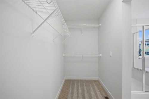 145 Topaz Place, Cochrane, AB - Indoor With Storage