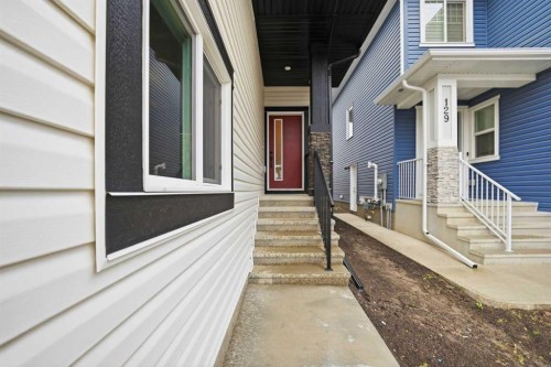 145 Topaz Place, Cochrane, AB - Outdoor With Exterior