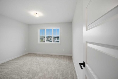145 Topaz Place, Cochrane, AB - Indoor Photo Showing Other Room