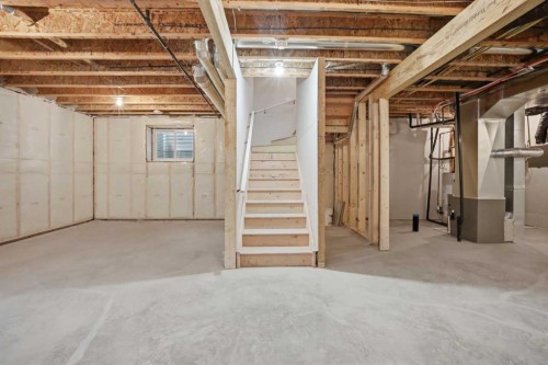145 Topaz Place, Cochrane, AB - Indoor Photo Showing Basement