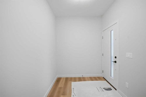 145 Topaz Place, Cochrane, AB - Indoor Photo Showing Other Room