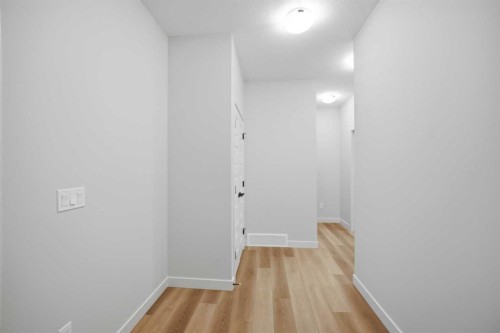 145 Topaz Place, Cochrane, AB - Indoor Photo Showing Other Room
