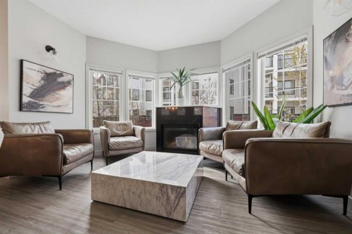 317-60 Royal Oak Plaza Nw, Calgary, AB - Indoor Photo Showing Living Room With Fireplace