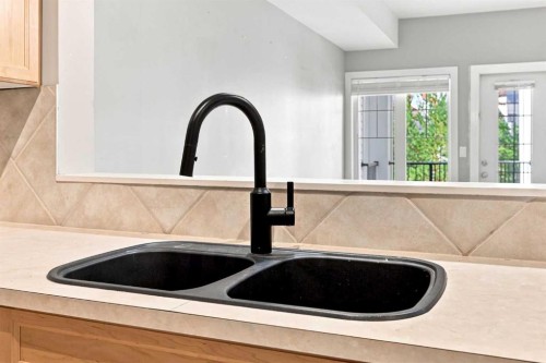 317-60 Royal Oak Plaza Nw, Calgary, AB - Indoor Photo Showing Kitchen With Double Sink