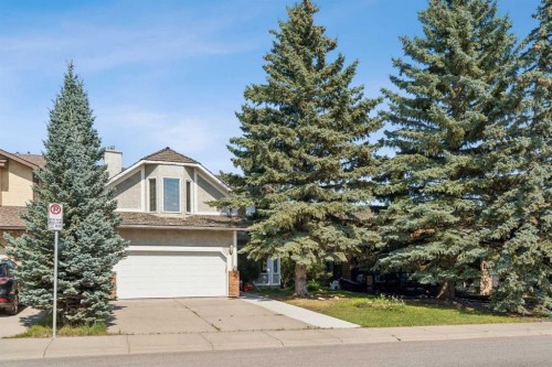 728 Shawnee Drive Sw, Calgary, AB - Outdoor With Facade