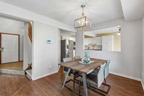 728 Shawnee Drive Sw, Calgary, AB - Indoor Photo Showing Dining Room