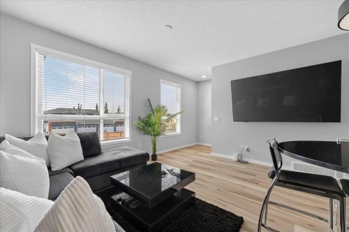 401-81 Midtown Boulevard Sw, Airdrie, AB - Indoor Photo Showing Living Room
