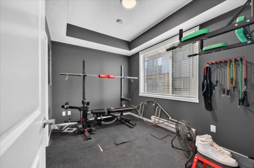 401-81 Midtown Boulevard Sw, Airdrie, AB - Indoor Photo Showing Gym Room