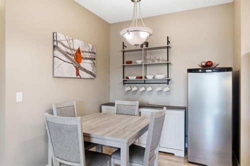207-72 Quigley Drive, Cochrane, AB - Indoor Photo Showing Dining Room