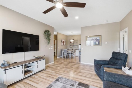 207-72 Quigley Drive, Cochrane, AB - Indoor Photo Showing Living Room