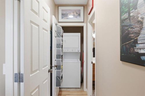 207-72 Quigley Drive, Cochrane, AB - Indoor Photo Showing Laundry Room