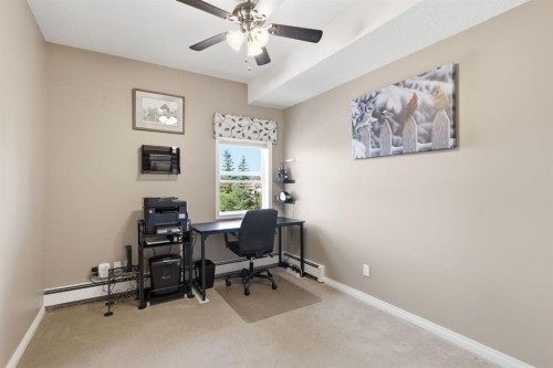 207-72 Quigley Drive, Cochrane, AB - Indoor Photo Showing Office