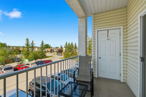 207-72 Quigley Drive, Cochrane, AB - Outdoor With Exterior