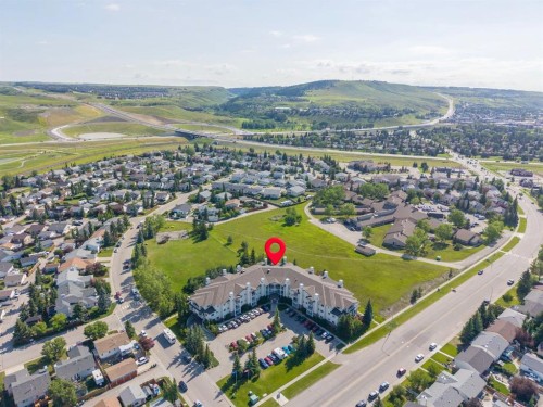 207-72 Quigley Drive, Cochrane, AB - Outdoor With View