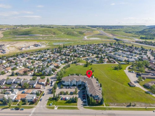 207-72 Quigley Drive, Cochrane, AB - Outdoor With View