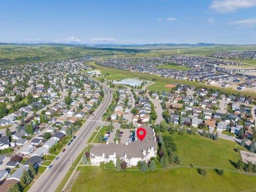 207-72 Quigley Drive, Cochrane, AB - Outdoor With View