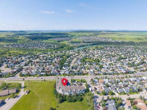 207-72 Quigley Drive, Cochrane, AB - Outdoor With View