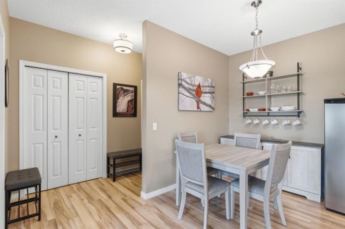 207-72 Quigley Drive, Cochrane, AB - Indoor Photo Showing Dining Room