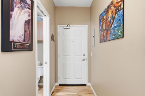 207-72 Quigley Drive, Cochrane, AB - Indoor Photo Showing Other Room