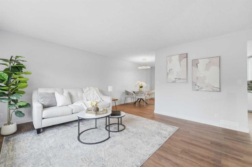 2220 Paliswood Road Sw, Calgary, AB - Indoor Photo Showing Living Room