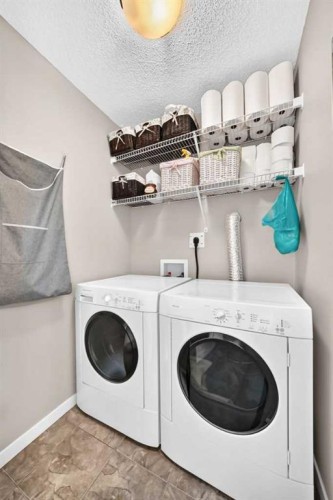 1915 Copperfield Boulevard Se, Calgary, AB - Indoor Photo Showing Laundry Room