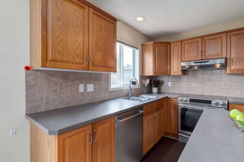 880 Prestwick Circle Se, Calgary, AB - Indoor Photo Showing Kitchen With Double Sink