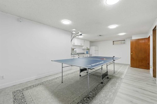 20 Rossburn Crescent Sw, Calgary, AB - Indoor Photo Showing Other Room