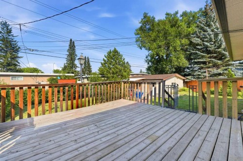 20 Rossburn Crescent Sw, Calgary, AB - Outdoor With Deck Patio Veranda With Exterior