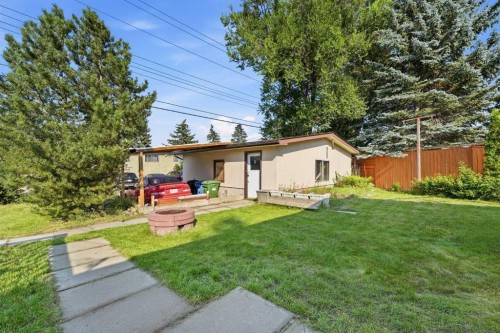 20 Rossburn Crescent Sw, Calgary, AB - Outdoor With Deck Patio Veranda