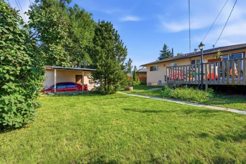 20 Rossburn Crescent Sw, Calgary, AB - Outdoor With Deck Patio Veranda