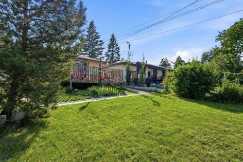 20 Rossburn Crescent Sw, Calgary, AB - Outdoor With Deck Patio Veranda