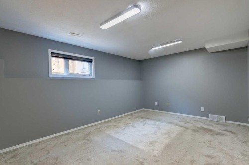 411 Shawinigan Drive Sw, Calgary, AB - Indoor Photo Showing Other Room