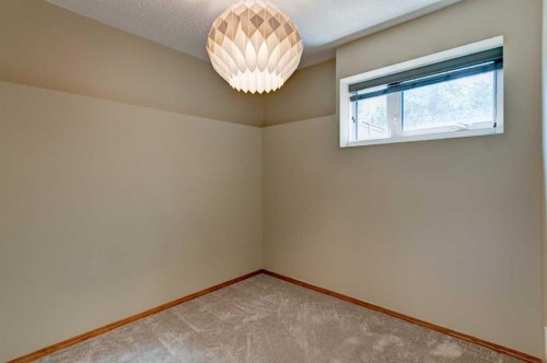 411 Shawinigan Drive Sw, Calgary, AB - Indoor Photo Showing Other Room