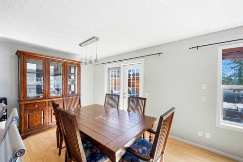 78 Cougar Plateau Way Sw, Calgary, AB - Indoor Photo Showing Dining Room