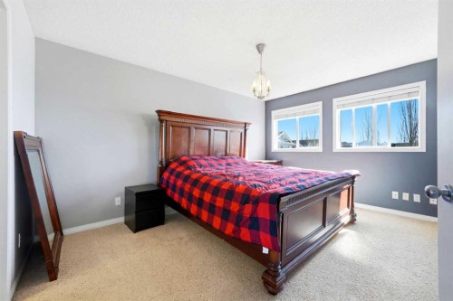78 Cougar Plateau Way Sw, Calgary, AB - Indoor Photo Showing Bedroom
