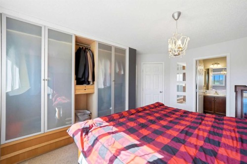 78 Cougar Plateau Way Sw, Calgary, AB - Indoor Photo Showing Bedroom