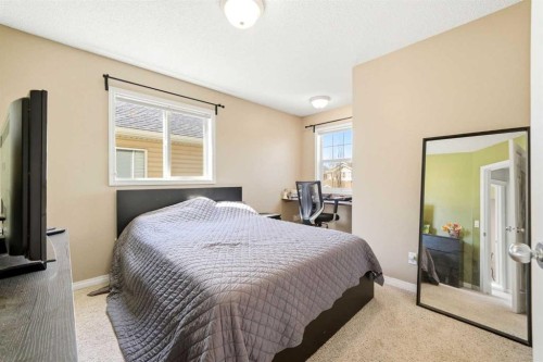 78 Cougar Plateau Way Sw, Calgary, AB - Indoor Photo Showing Bedroom