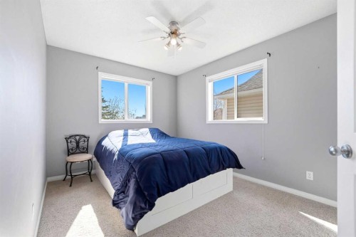 78 Cougar Plateau Way Sw, Calgary, AB - Indoor Photo Showing Bedroom