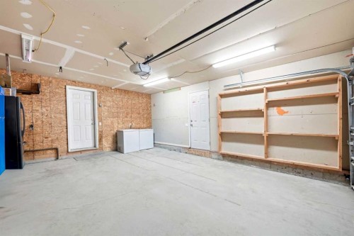 78 Cougar Plateau Way Sw, Calgary, AB - Indoor Photo Showing Garage