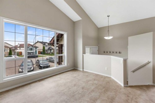86 Saddlemont Close Ne, Calgary, AB - Indoor Photo Showing Other Room