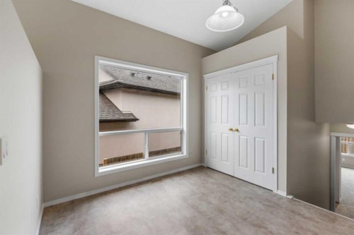 86 Saddlemont Close Ne, Calgary, AB - Indoor Photo Showing Other Room