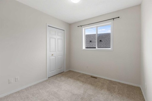 86 Saddlemont Close Ne, Calgary, AB - Indoor Photo Showing Other Room